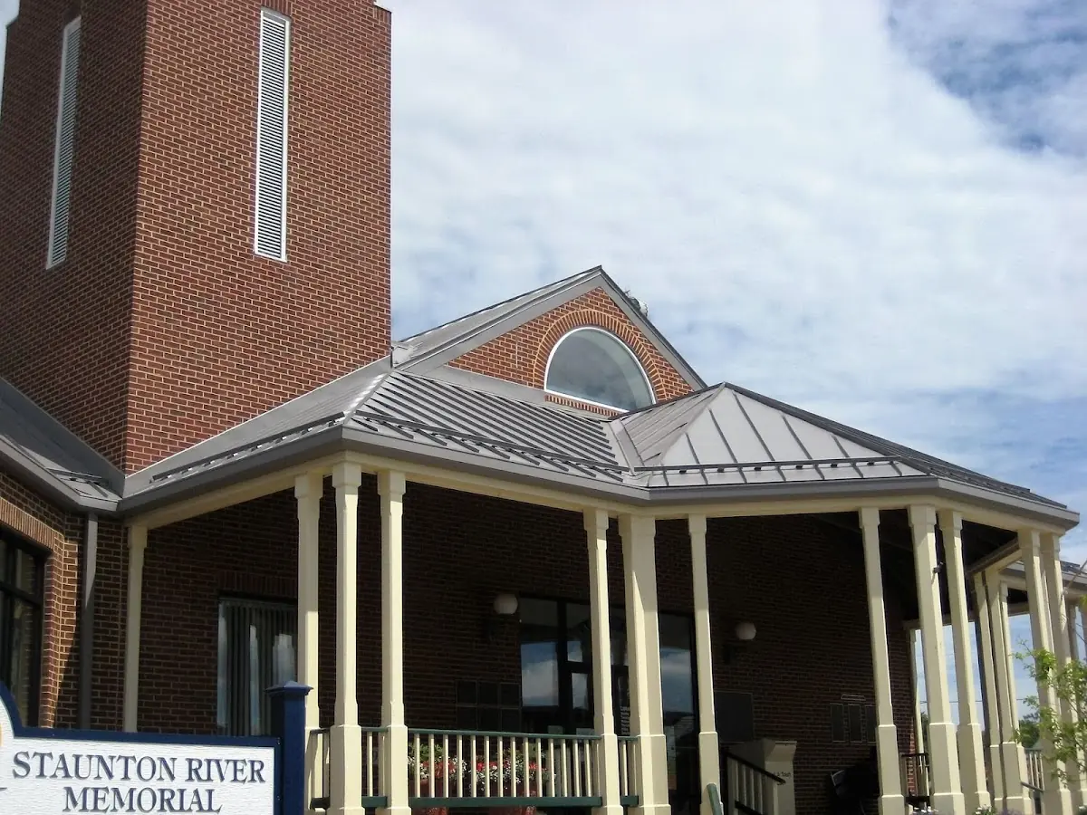 Skilled roofing craftsmen working on a residential roof in Southport